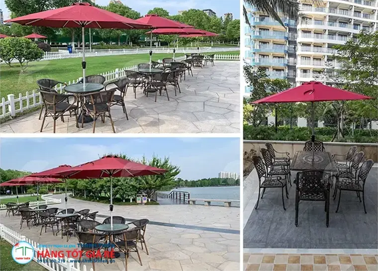 Nhiều ô dù chính tâm đỏ đô bố trí đồng bộ tại dự án cafe ven hồ — minh hoạ triển khai quy mô thực tế