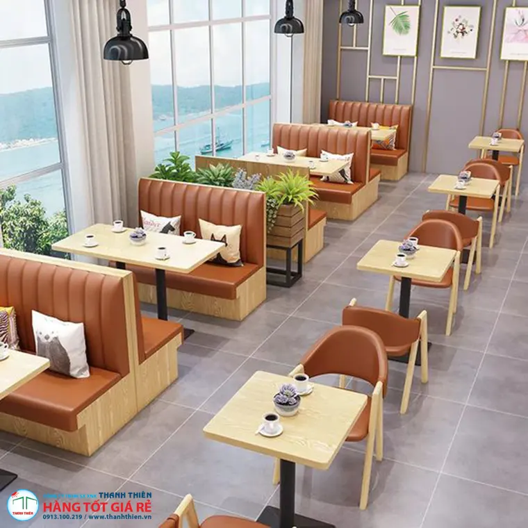 Bàn ghế cafe lounge booth da bò và bàn gỗ chân sắt — giải pháp cho mô hình quán giữ khách ngồi lâu