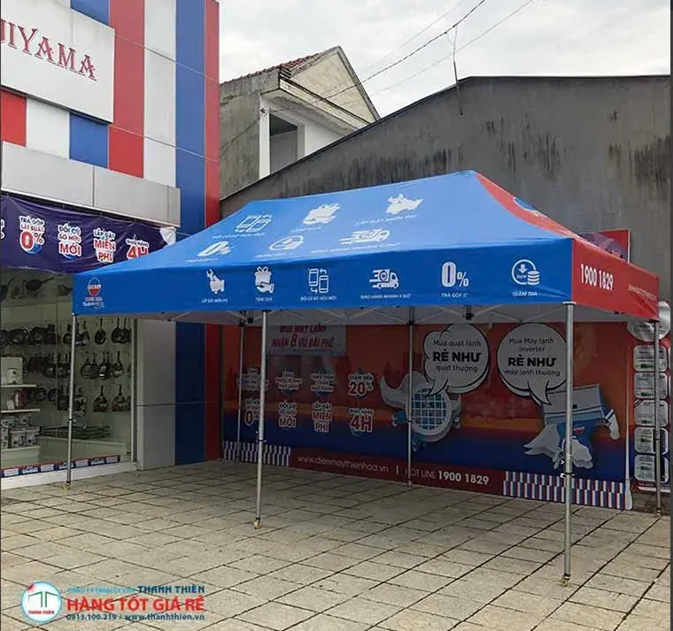 Lều xếp điện máy Thiên Hòa in logo 4 mặt tại sự kiện khai trương — mái + 3 vách in đầy đủ thông tin thương hiệu
